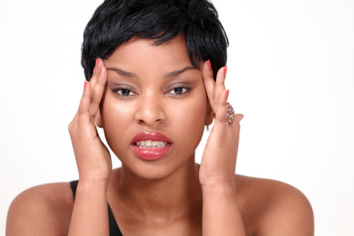 Pretty girl with headache and stress